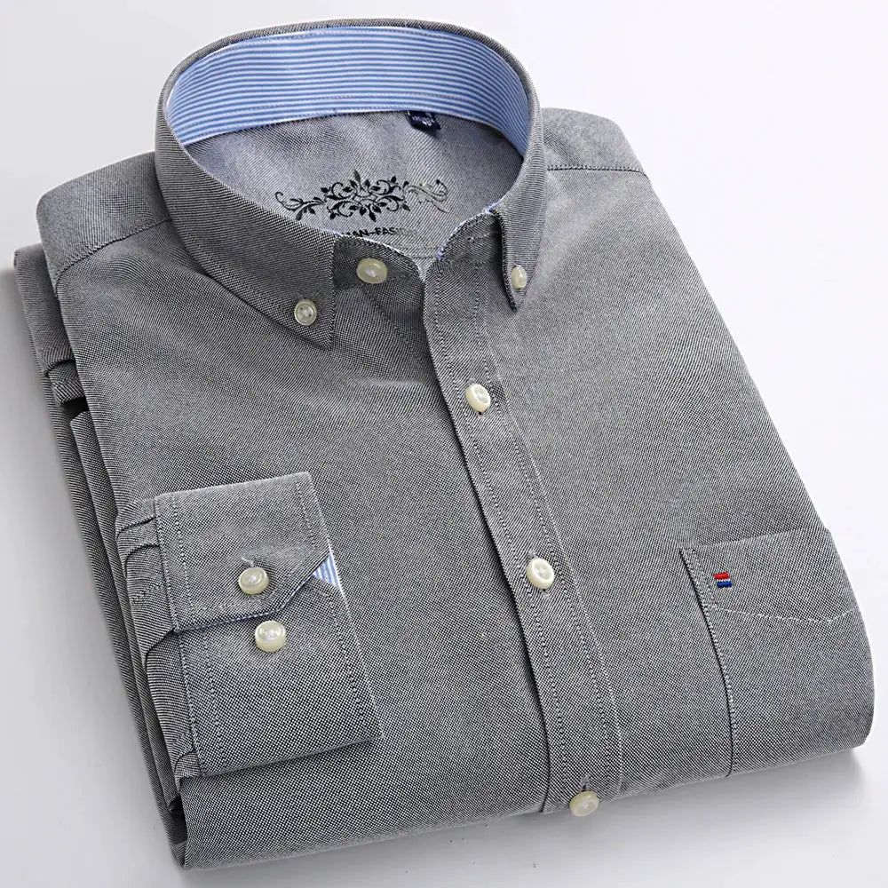 Men's gray long-sleeve oxford shirt with single chest patch pocket and button-down front, blue striped inner collar.