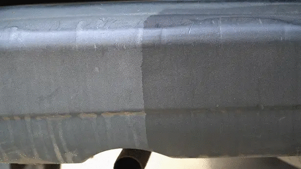Car plastic trim restorer ceramic coating; black bumper trim shows wear and uneven shade