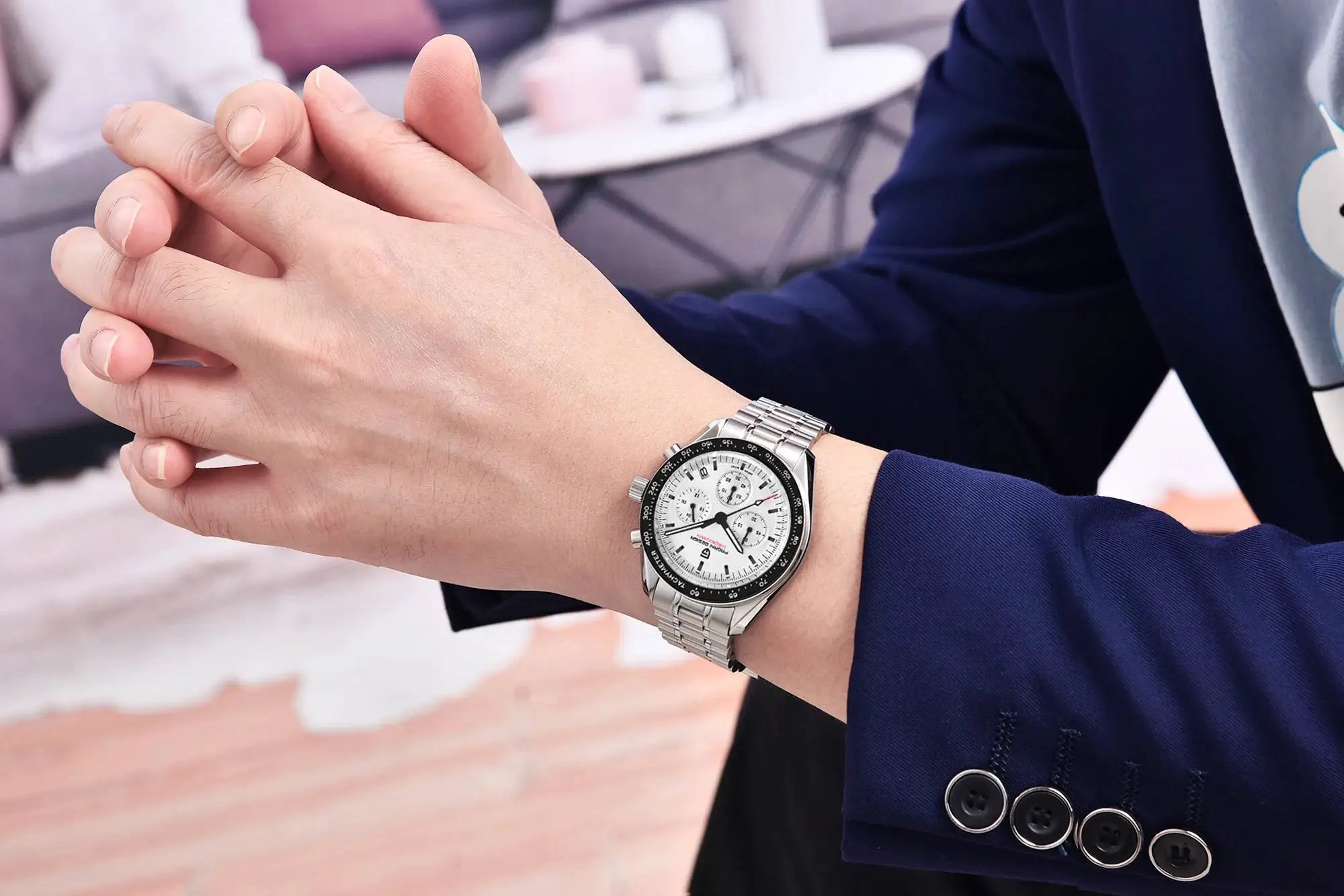 PAGANI DESIGN men's chronograph wristwatch with white dial, black bezel, and stainless steel bracelet.