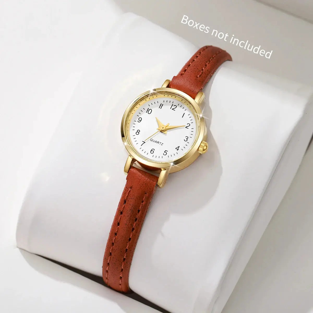 Women's quartz wristwatch by Simples Market with gold-tone case, brown leather strap, white dial
