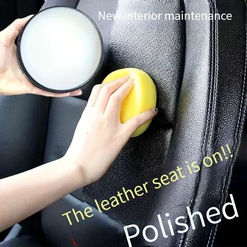 Simples Market leather care cream for car interiors being applied with a yellow sponge on a black leather seat