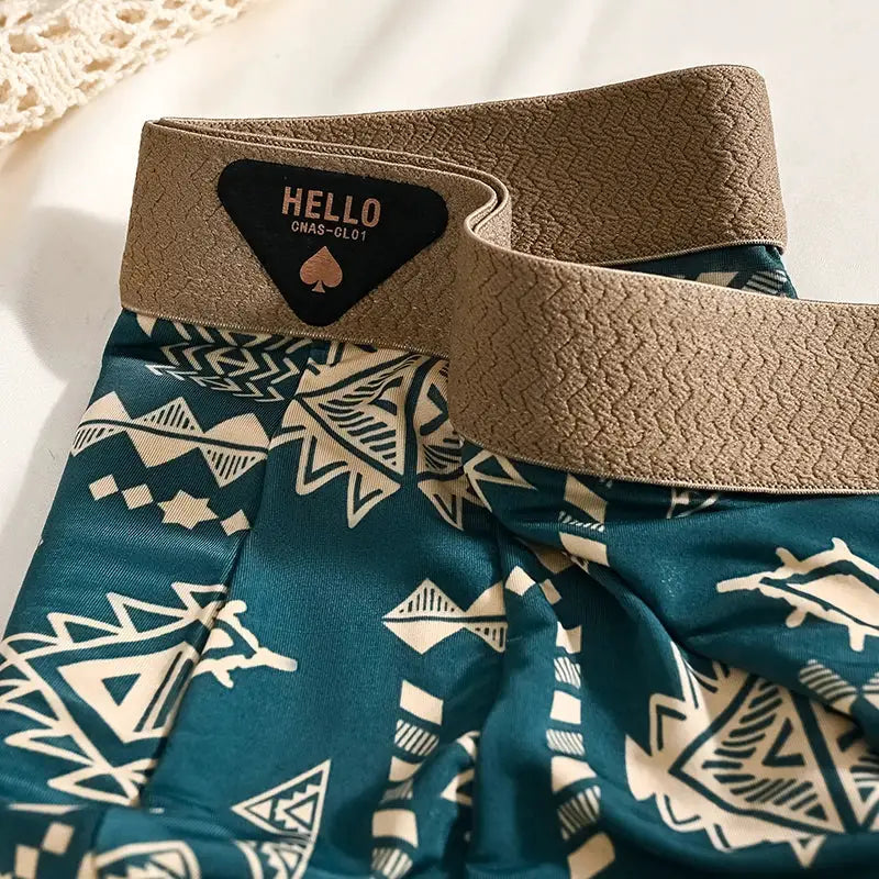 Boxer shorts Simples Market in teal geometric pattern with beige elastic waistband