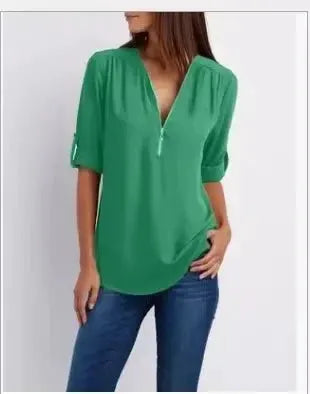 Green chiffon blouse for women with deep V-neck and loose short-sleeve pullover style