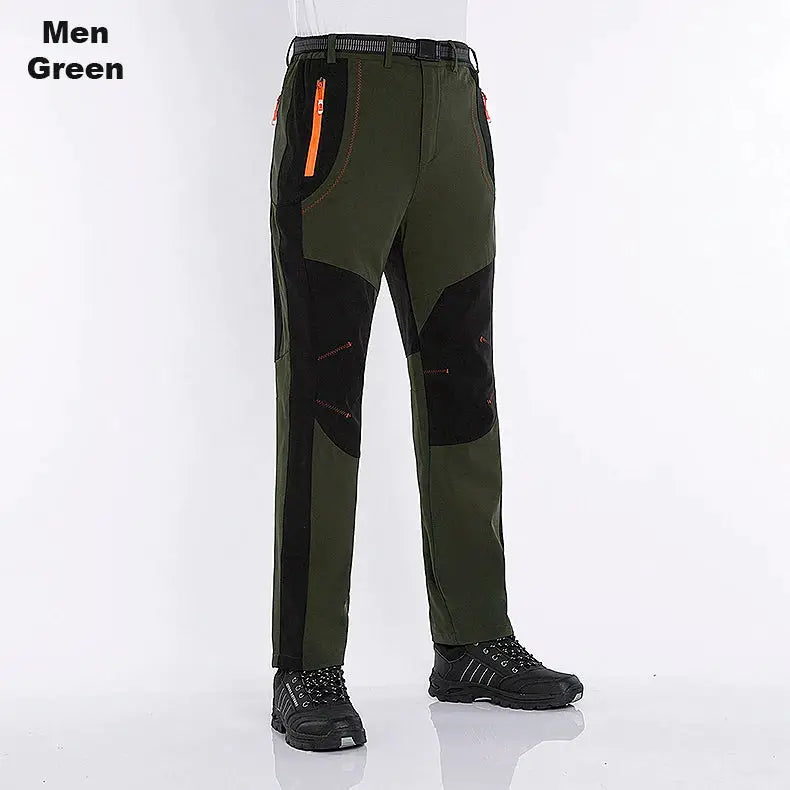 JNLN men's green hiking pants with black knee patches, orange zip pockets, and belted waist