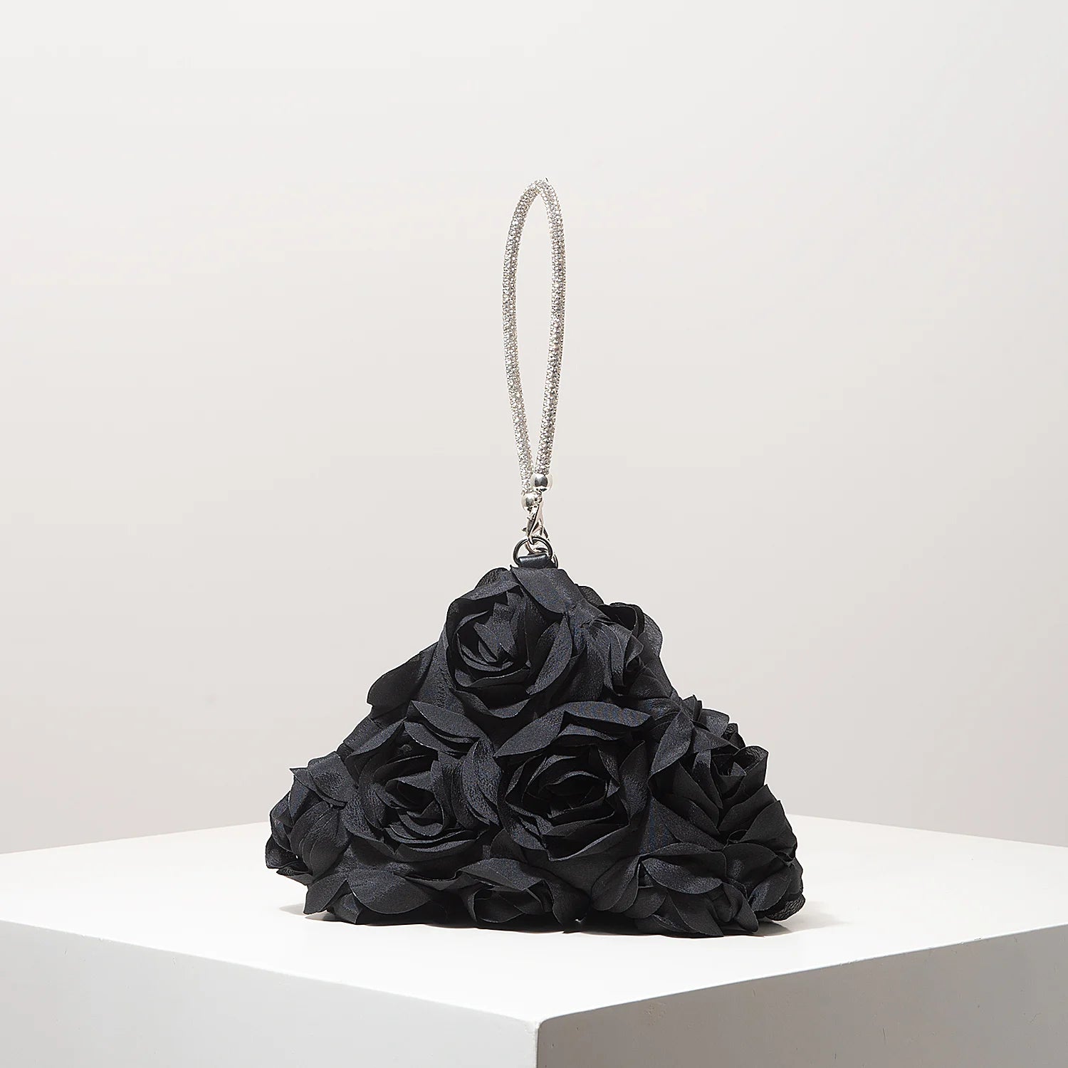 Mini floral clutch purse with crystal-embellished strap, black rose-inspired bag