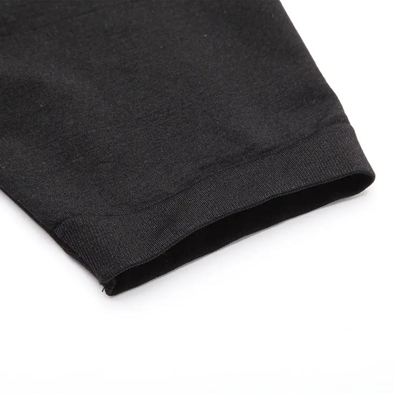 Men's black seamless compression undershirt cuff with ribbed knit edge