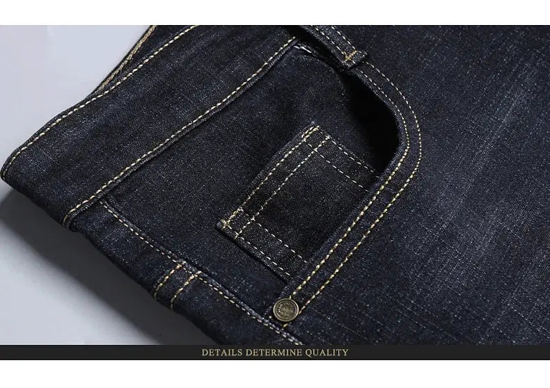 Men's classic jeans by Simples Market in dark denim with contrast stitching and copper rivet