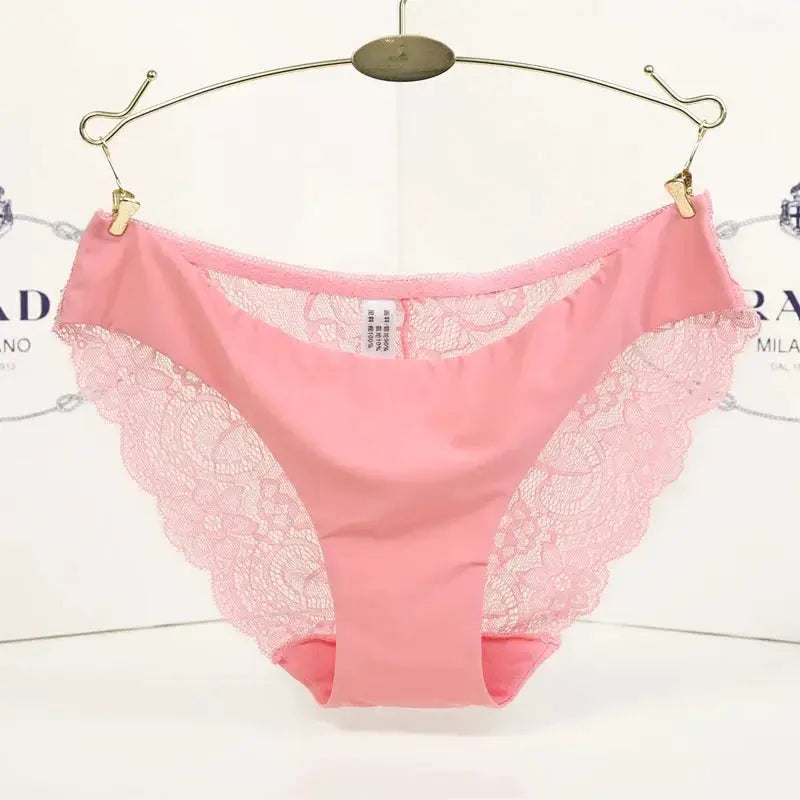Pink lace-trim low-rise panties for women on a hanger, breathable fabric