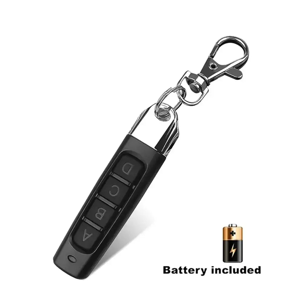 Black 433MHz garage door remote key fob with four buttons on a metal keychain clip; battery included