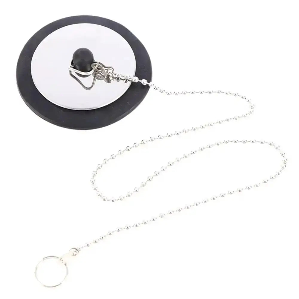 Rubber tub stopper with chain from Simples Market; black plug with silver hanging chain
