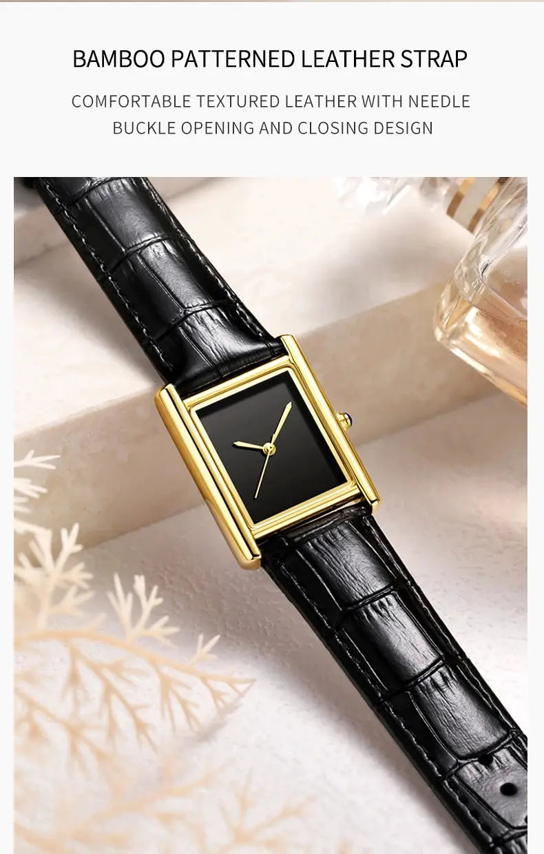 Gold-tone rectangular wristwatch with black crocodile-pattern leather strap.