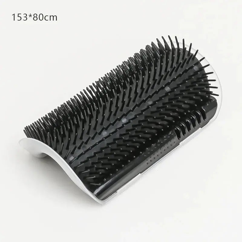 Cat massage brush; black bristles with white curved base.
