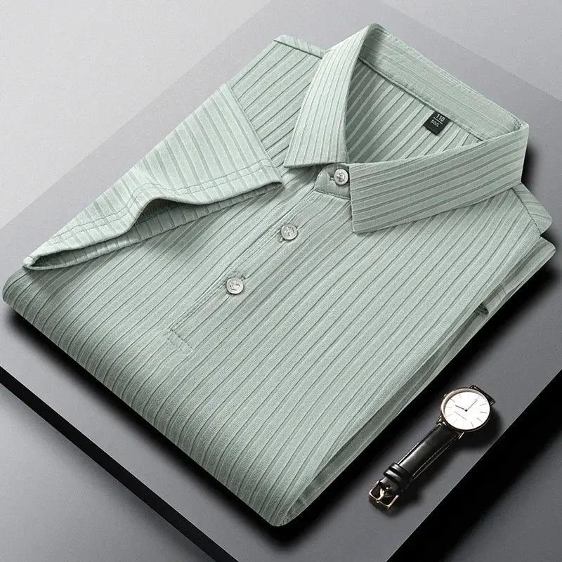 Men's light-green striped short-sleeve polo shirt and a black leather watch, Simples Market.