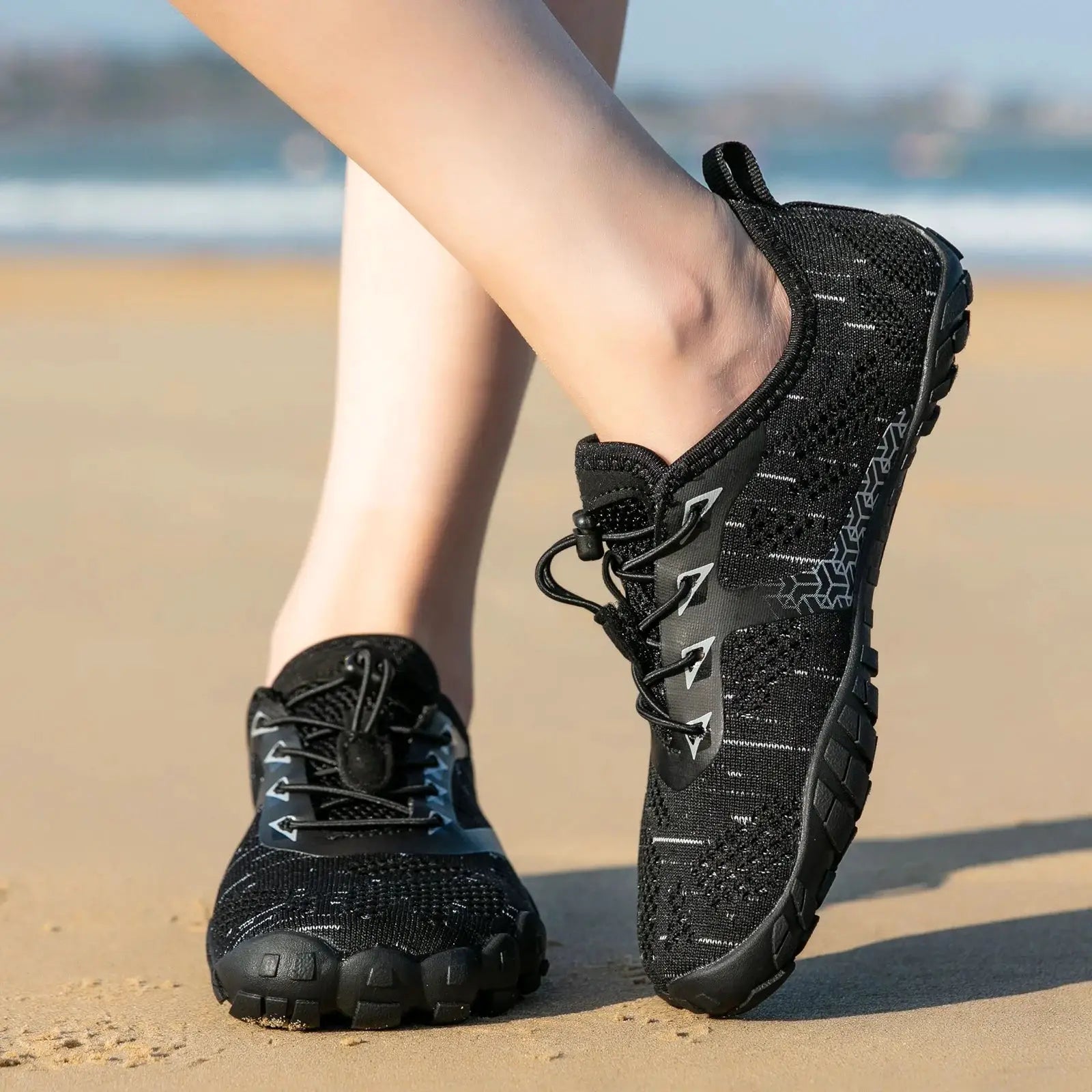 Trail running shoes Simples Market, black knit upper with rugged outsole, wide width, 2 pairs shown.