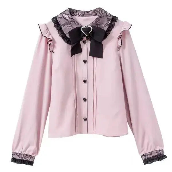 Gothic Lolita blouse in pink by Simples Market with black lace collar and heart buttons