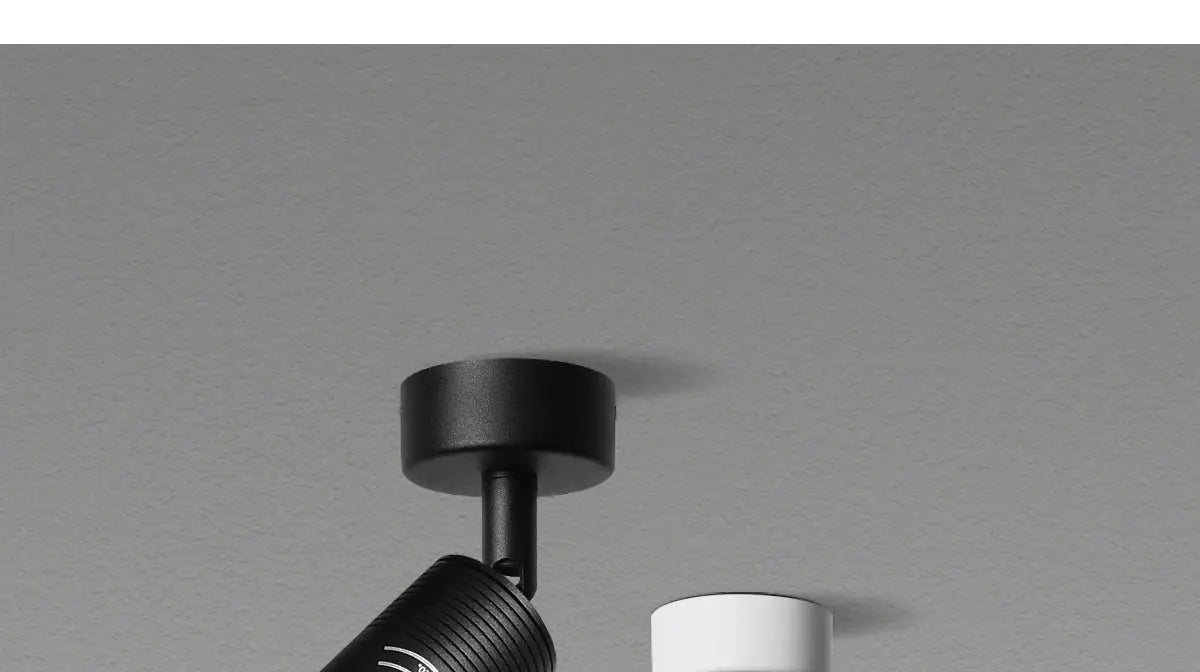Simples Market adjustable LED spotlight, black surface-mounted ceiling light, 7W zoomable with 5°–60° beam angle