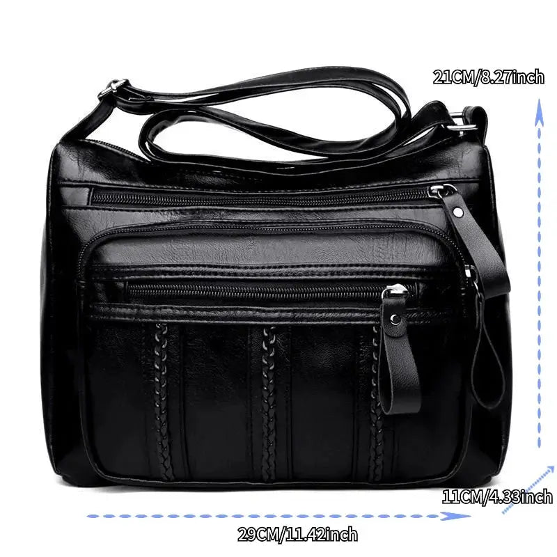 Simples Market black leather crossbody bag with multiple front pockets and long strap, large capacity