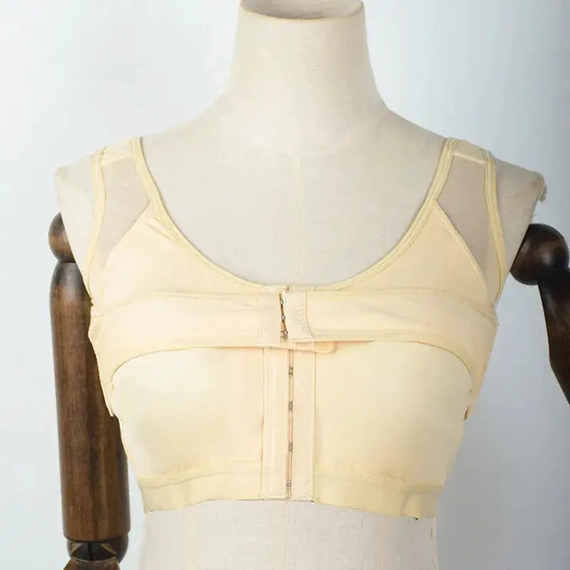 Beige nude post-surgery implant-stabilizing front-closure compression bra for women