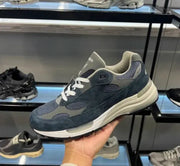 Retro mesh running shoes in blue-gray with white laces and chunky white sole