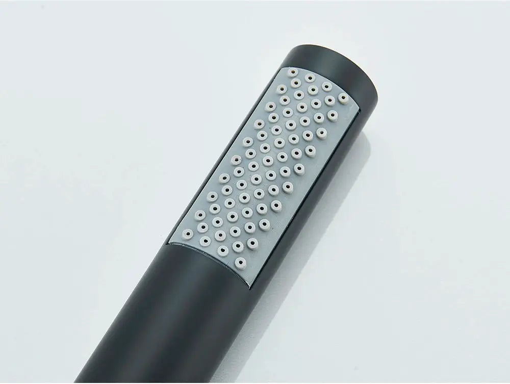 Simples Market handheld shower head; black plastic body with silver spray face, single-function.