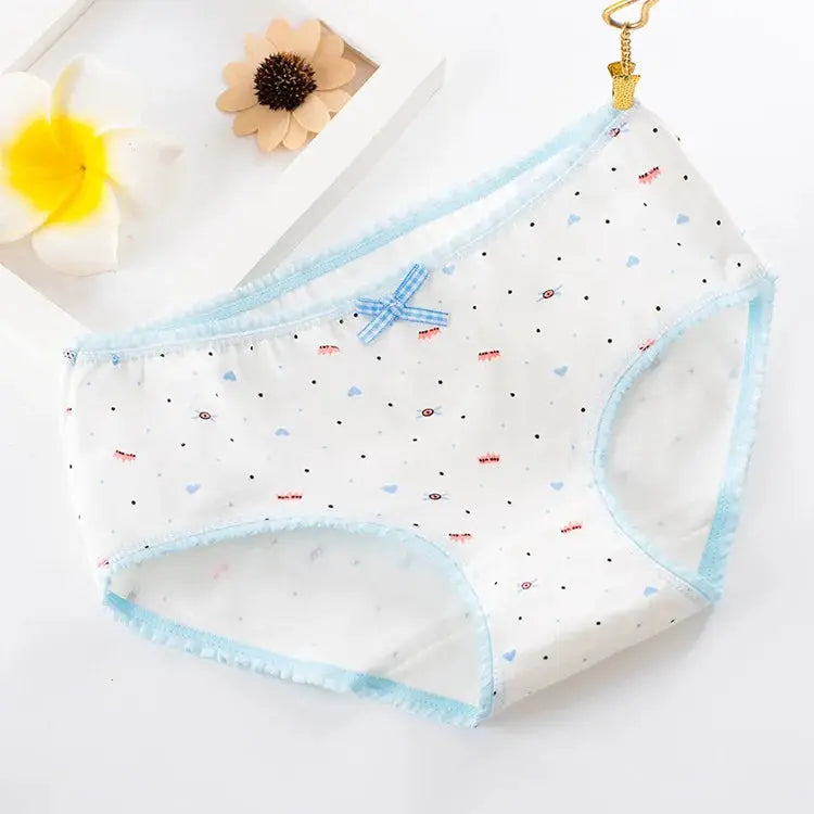 1 pair women's cotton seamless panties; white with tiny blue hearts and dots, light blue trim and small blue bow