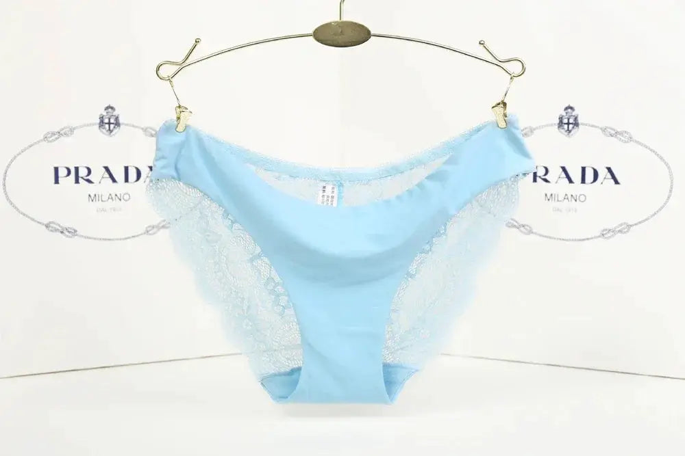 Simples Market light blue lace thong underwear for women; low-rise with lace sides.