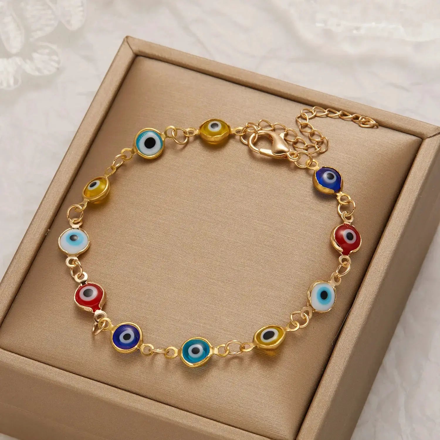 Lucky Turkey evil eye bracelet with colorful blue, red, yellow beads on a gold-tone adjustable chain