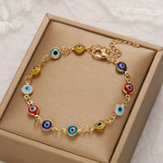 Lucky Turkey evil eye bracelet with colorful blue, red, yellow beads on a gold-tone adjustable chain