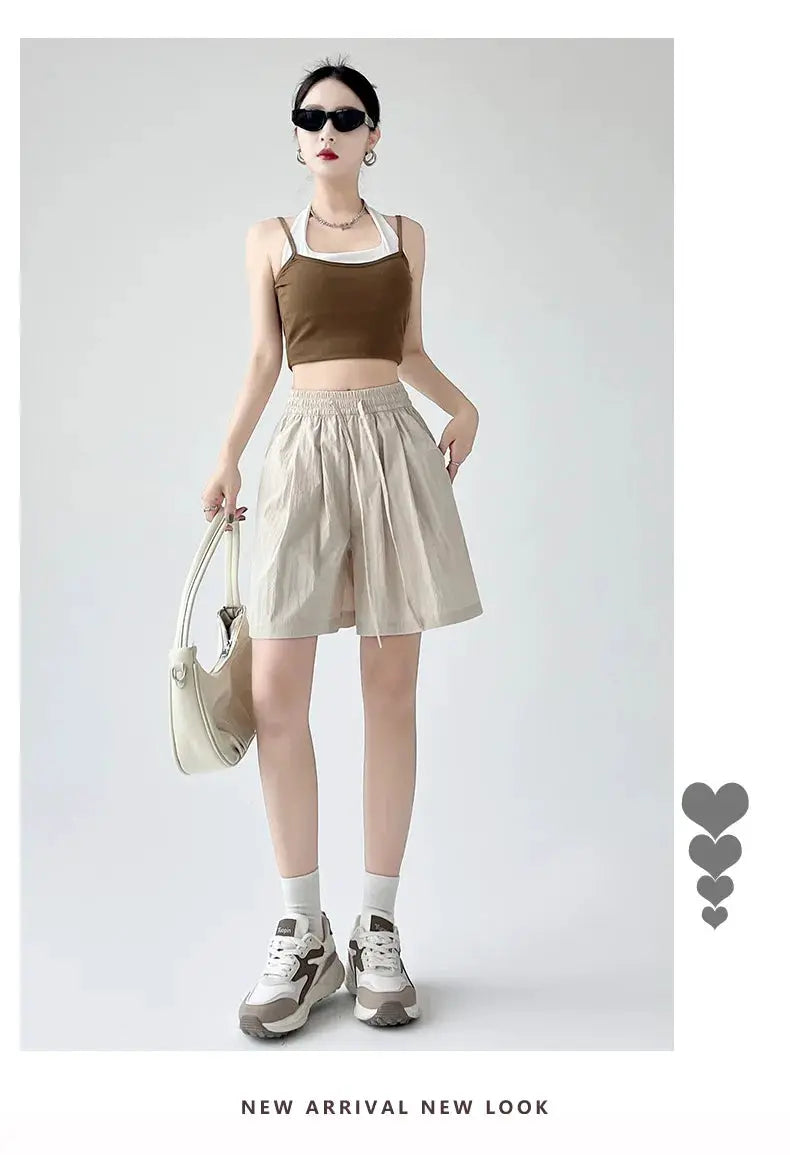 Summer women shorts beige high-waist loose fit with two pockets and elastic waistband