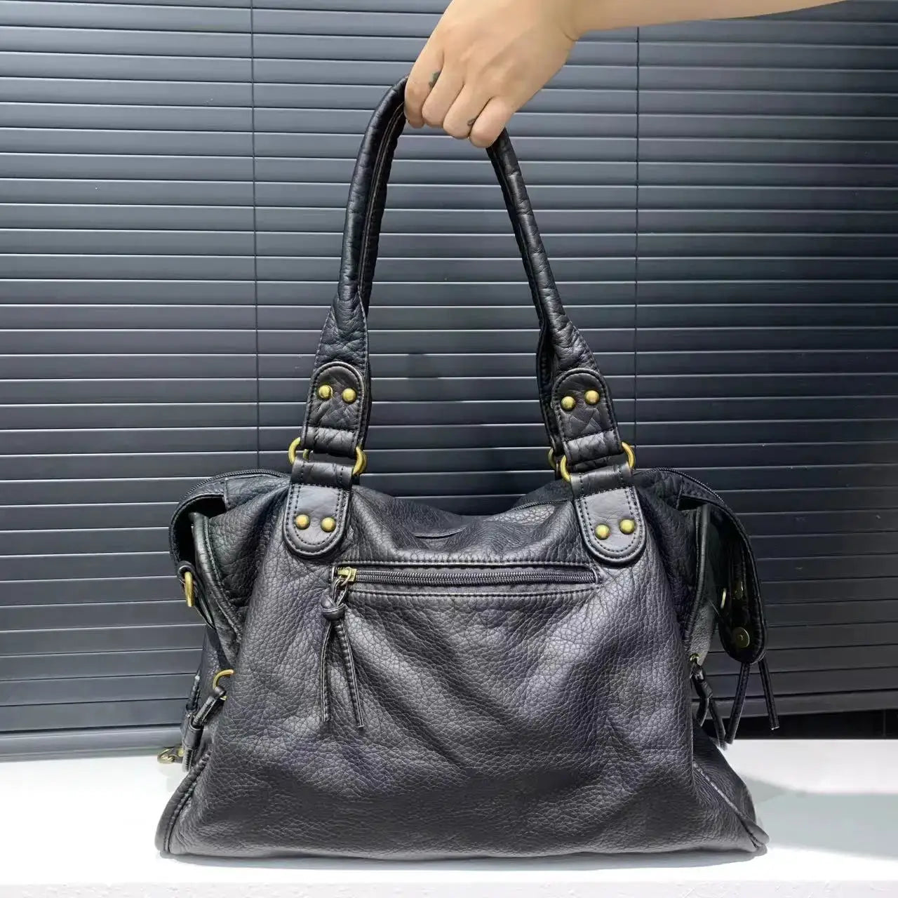 Y2K Spicy Girl black washed leather handbag with twin handles, gold hardware, front zip pocket