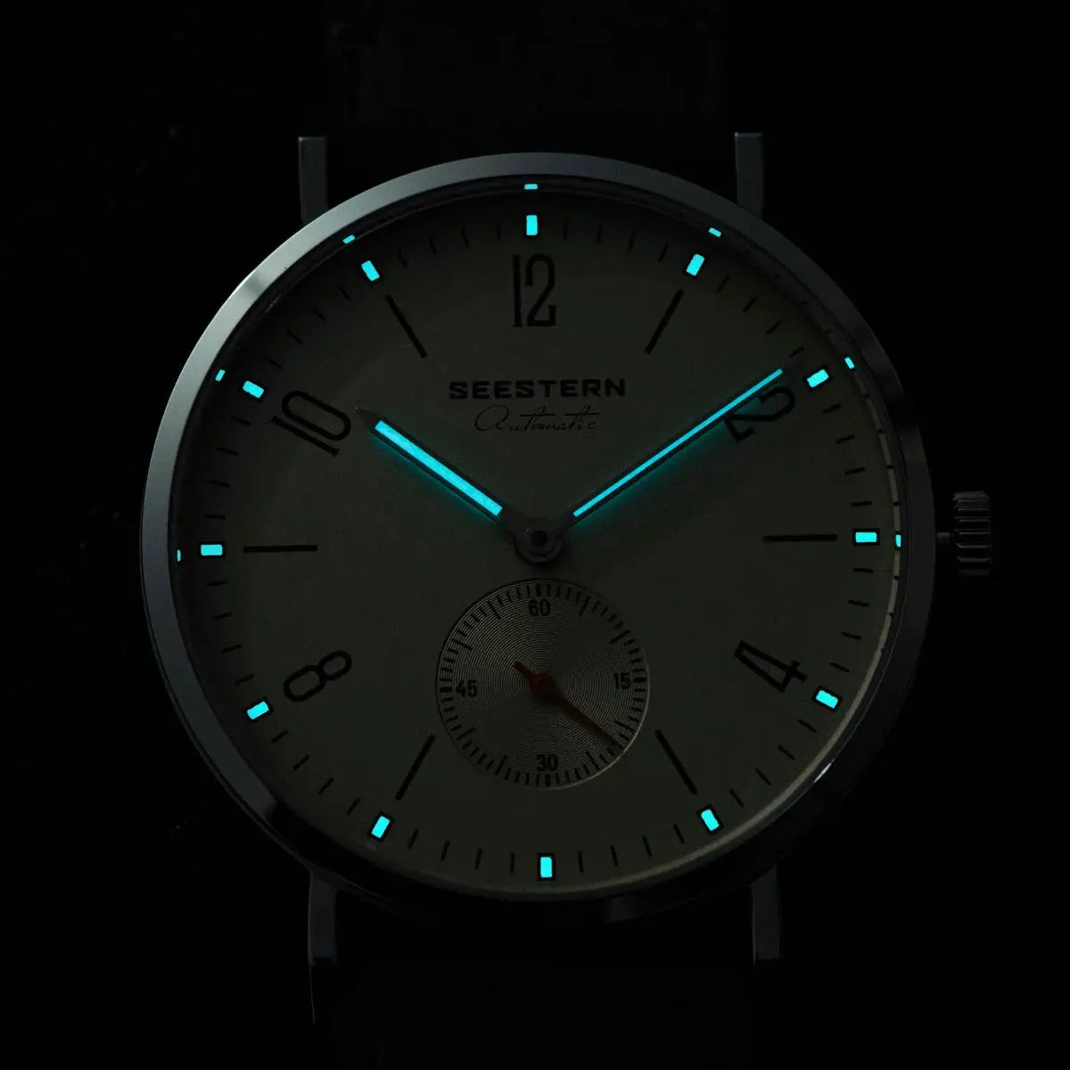 SEESTERN men's automatic wristwatch with luminous blue hands and markers, silver-tone case