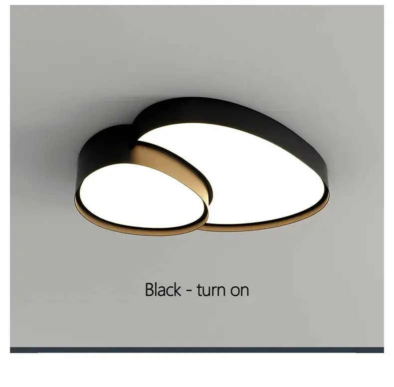 Modern LED ceiling lamp with black and white overlapping circular rings, remote control; Simples Market fixture.