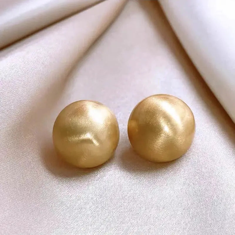 Gold-tone brushed frosted metal round stud earrings, pair