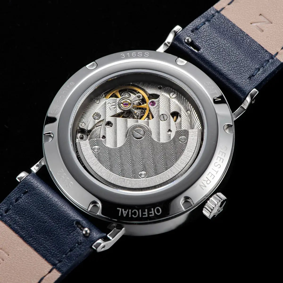 Seestern men's automatic wristwatch back view; stainless steel case, blue leather strap, visible movement