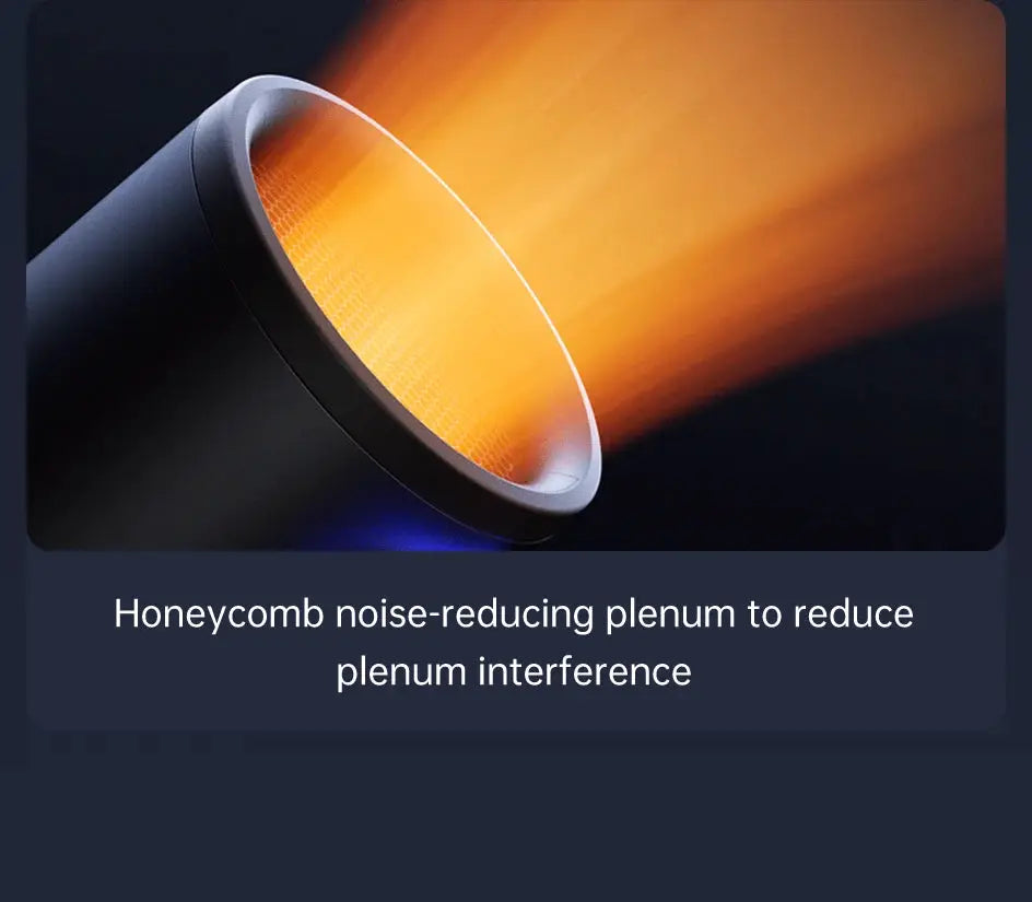 JISULIFE portable turbo handheld fan, black finish, close-up of the nozzle with honeycomb inner texture and warm glow