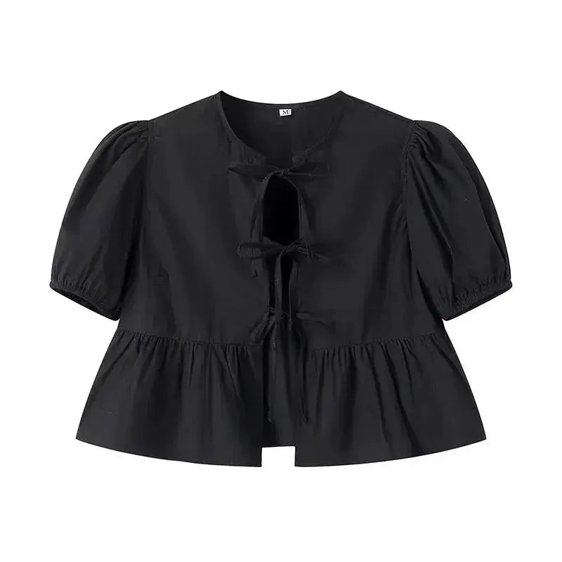 Black puff-sleeve blouse with tie-front and peplum hem by Simples Market