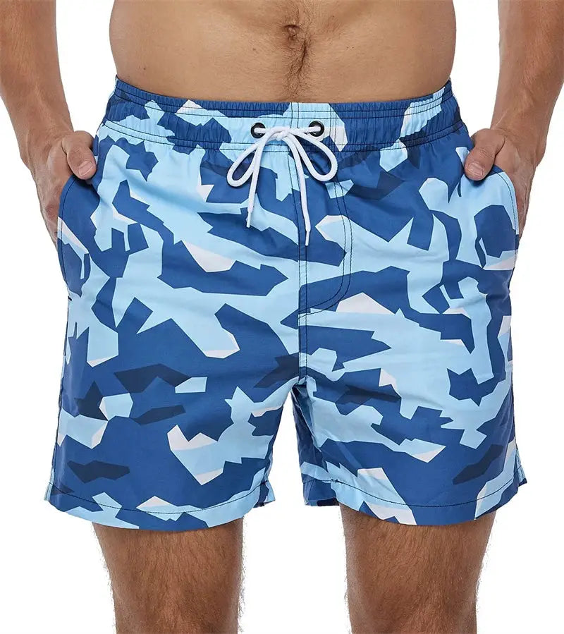 Simples Market blue camouflage print swim trunks with white drawstring