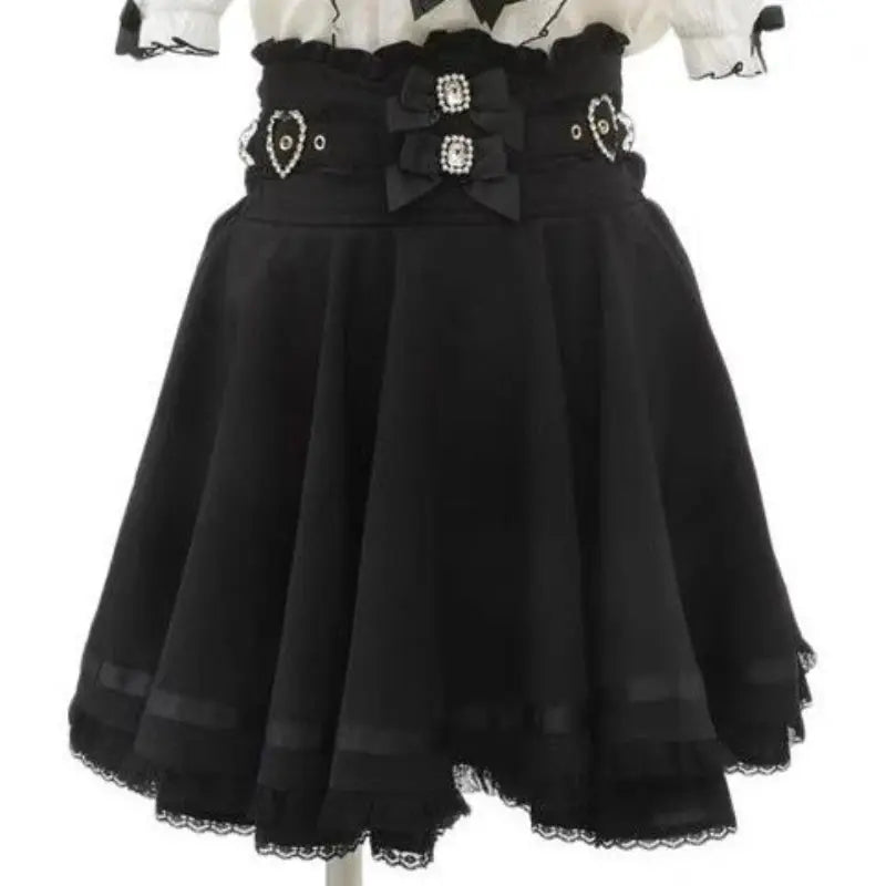 Girls' black lace-hem A-line skirt with double bow belt and rhinestone accents, Simples Market