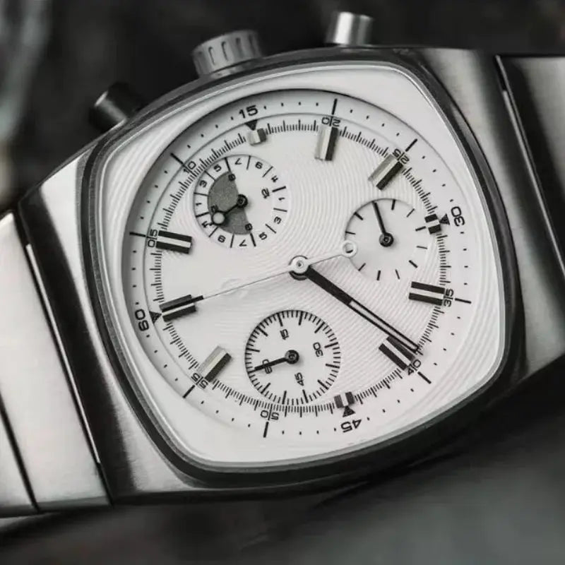 Men's wristwatch with silver stainless steel case and white chronograph dial with three subdials.