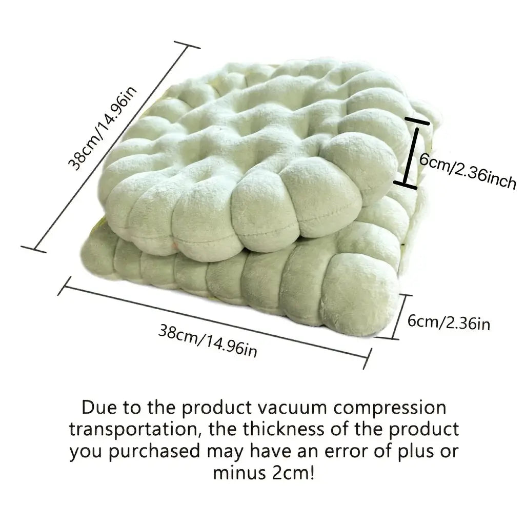 Large biscuit-shaped plush cushion, mint green, 38cm square and 6cm thick.