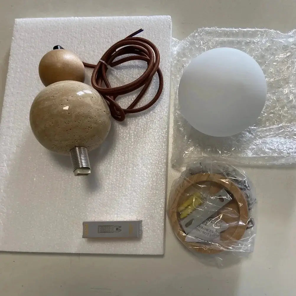 Cream Style Pendant Lamp kit from Simples Market with stone spheres, brown cord, and frosted glass shade