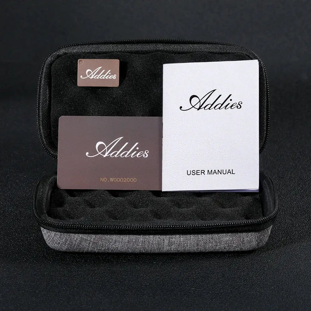 Addies women's watch set in a black zip case with three items: user manual, brown branding card, and small Addies tag