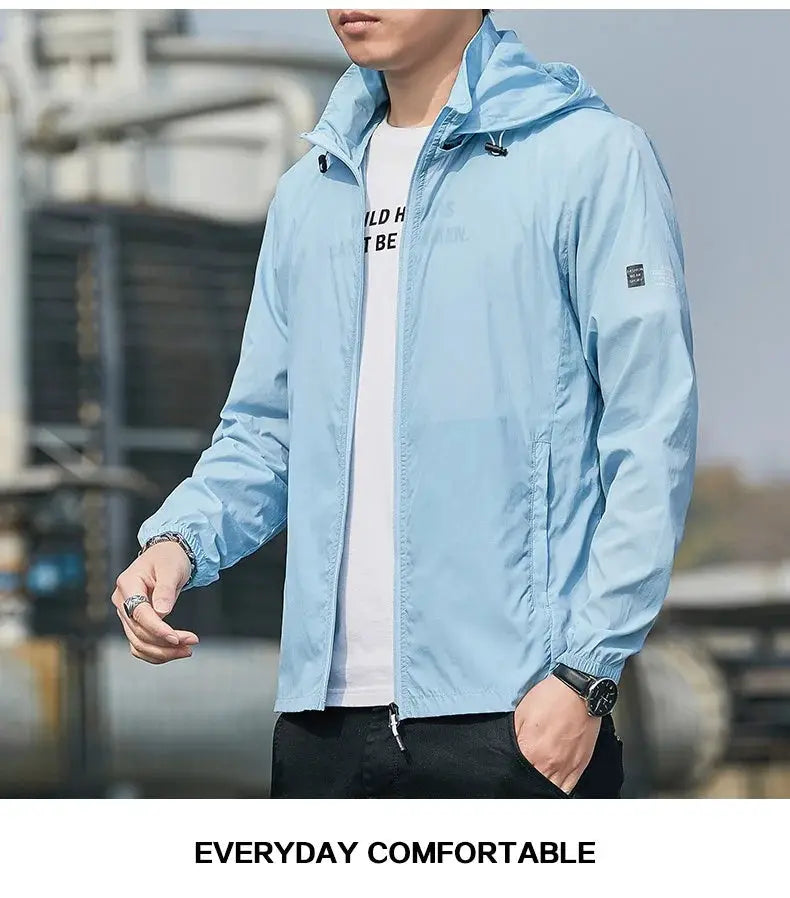 Hooded windbreaker jacket in light blue, waterproof and quick-dry by Simples Market for men and women