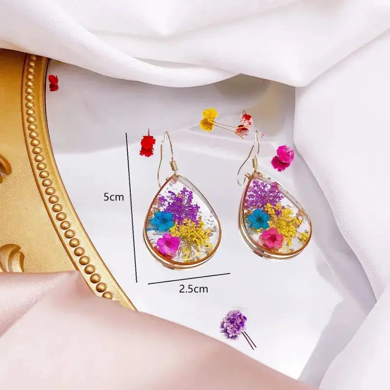 Simples Market colorful pressed flower earrings pair in teardrop epoxy resin with gold frame