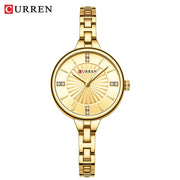 CURREN gold-tone women's quartz watch with crystal markers on a metal bracelet
