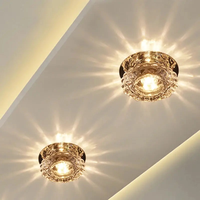 Aisle Flush LED ceiling lamp with crystal glass, pair of flush-mounted fixtures casting warm light.