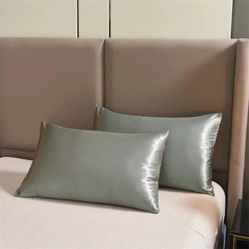 3pc satin duvet cover set, queen size, sage green with matching satin pillow shams on a padded headboard bed