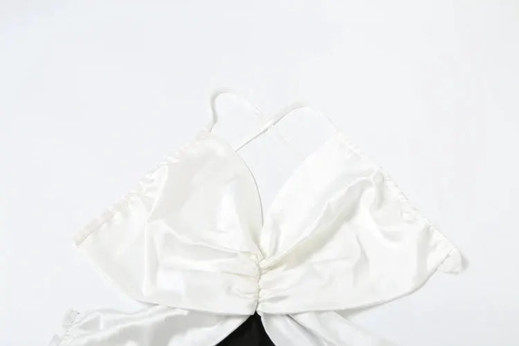 White satin cross-pleated backless jumpsuit with halter straps, sleek women’s party overalls