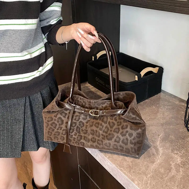 Leopard print PU leather tote bag with brown double handles and a gold buckle, women's handbag.