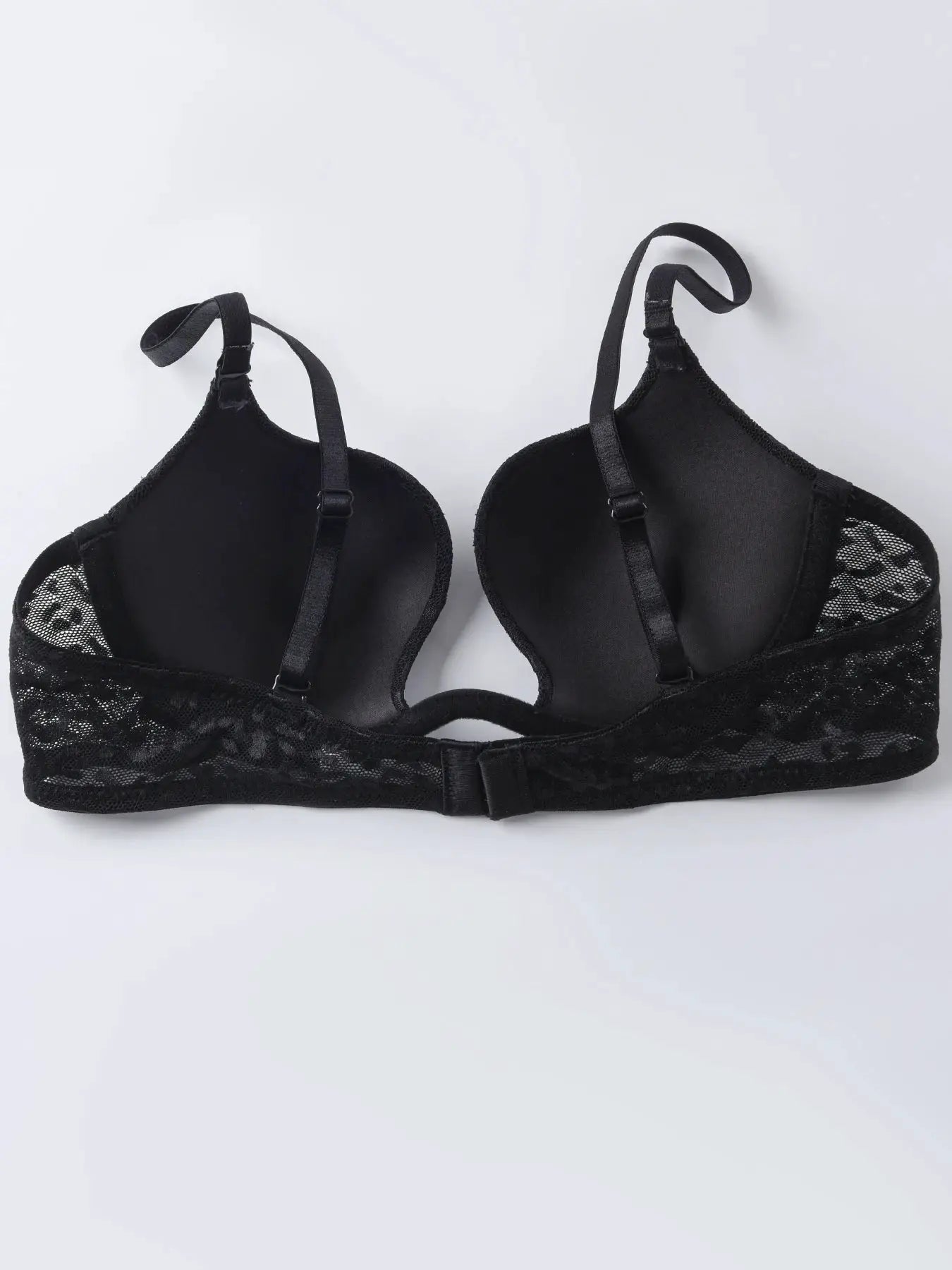 Solid black lace underwire bra with padded cups and adjustable straps